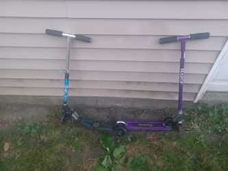 2 kids push scooters solid condition