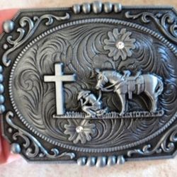 New horse western cowbiy praying at cross belt buckle