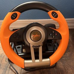 V3 PRO steering wheel orange and black color and pretty good size