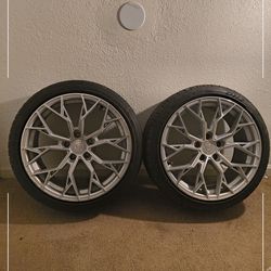 two aluminum rims with tires.$600 for both rims and both tires 225/40 ZR 18 92 W