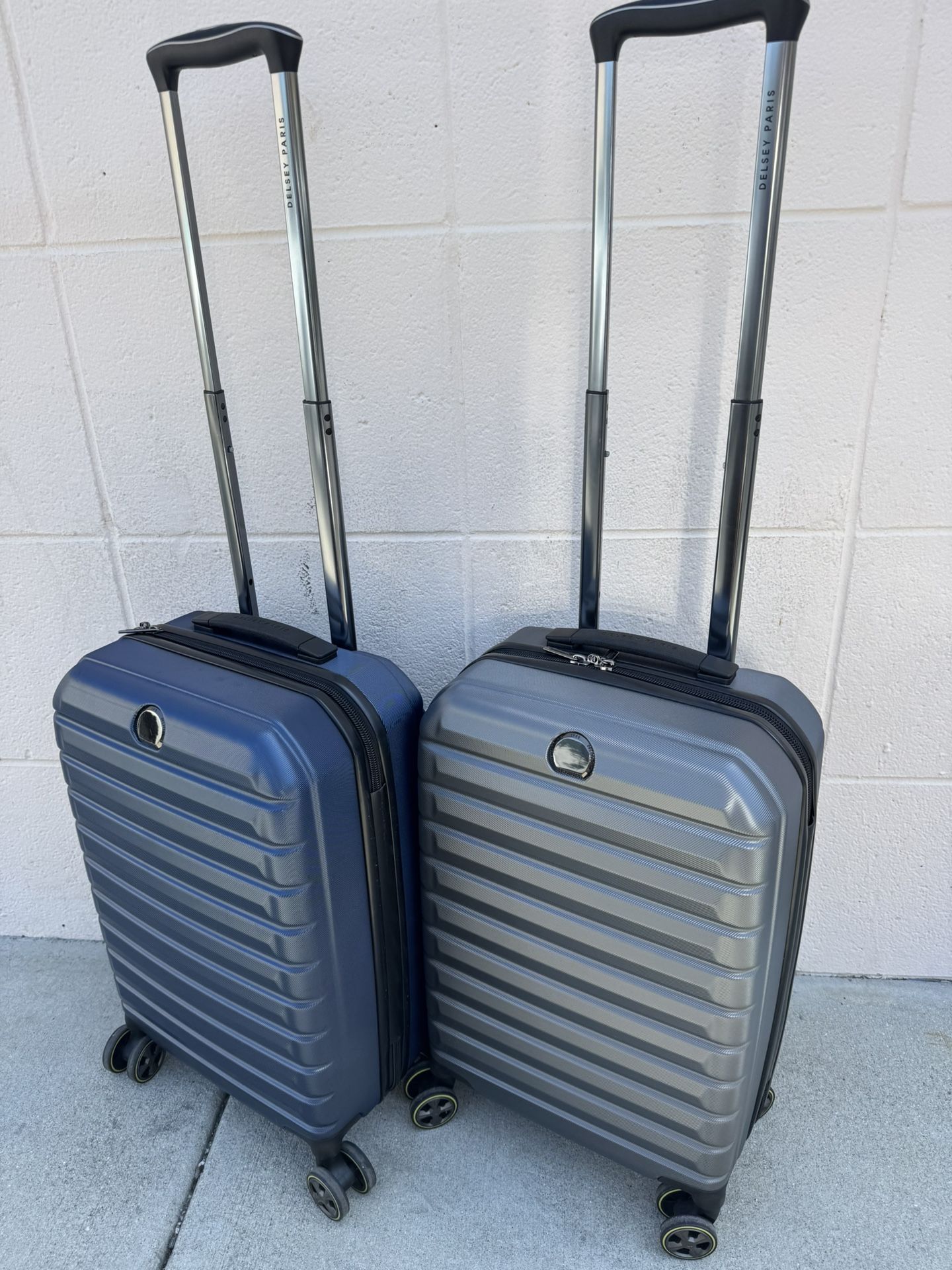 Delsey Hardcase Carry-On Spinner Luggage– Blue or Gray – New/Display Model