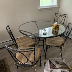 Genuine Wrought Iron With Tempered Glass Table and Chairs
