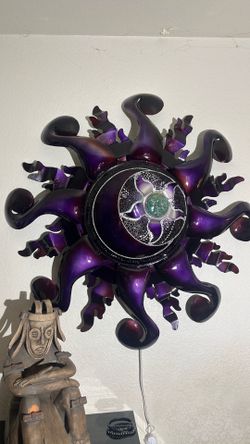 Metal sun w/ light