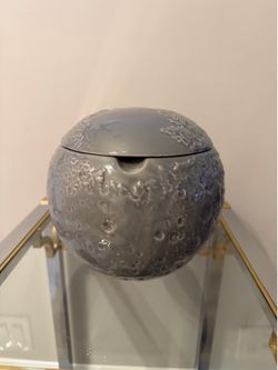 Moon shaped ceramic container