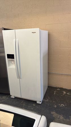 Nice Whirlpool side by side refrigerator