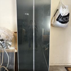 Two Book Shelves With Glass Doors 