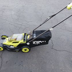 Ryobi 18 Volt Battery Powered Lawn Mower Kit. Includes 4.0 Amp Hour Battery And Charger. New