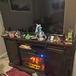Fireplace TV Stand. It Is Holding A 65inch TV For Comparison. Make Offer