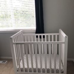 White Delta Mini Crib
