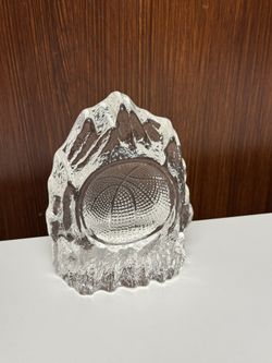 Elegant clear glass trophy with basketball design. Perfect for sports enthusiasts.  a molten glass basketball iceberg trophy , paperweight, ash tray o