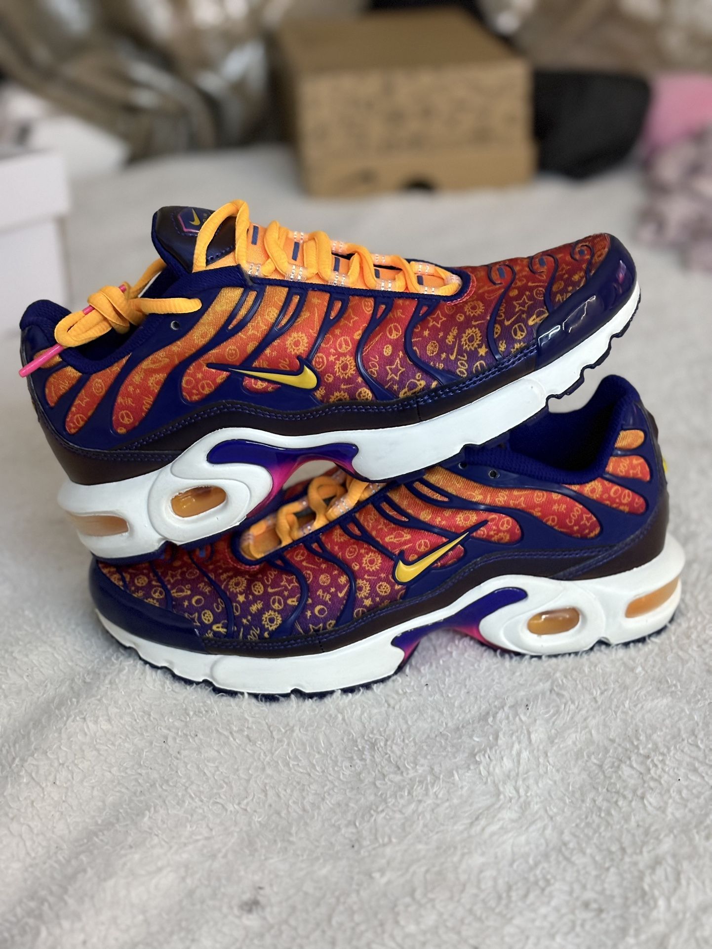 Nike Air Max Plus TN trainers in vibrant orange and purple hues #AirMaxPlusTN