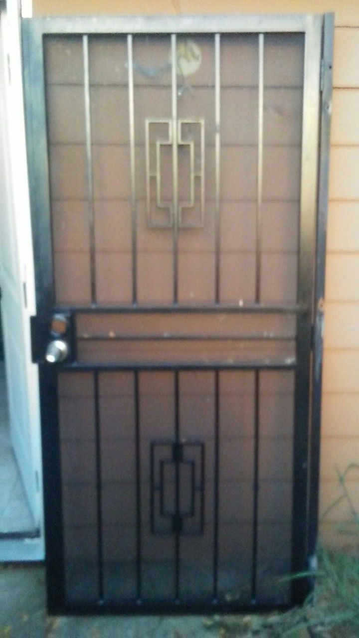 Iron gate for a door