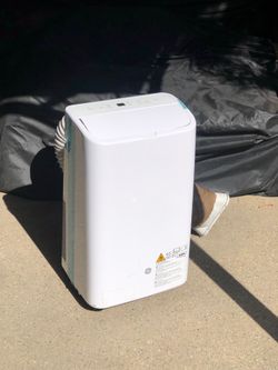 GE 7,500 (DOE) BTU Portable Air Conditioner 3-in-1 Cools 300 Sq. Ft. with Dehumidifier in White