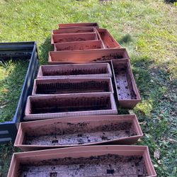 12 Used (Varying Sizes Of )Resin Planters