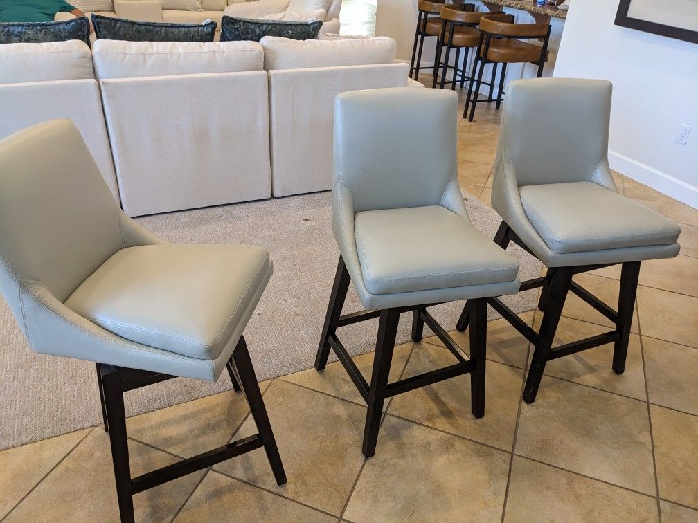 Set Of 3 Leather Like Swivel Bar Stools (1 Needs Repairs)