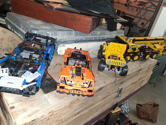 2 Lego sports cars jeep and big rig.