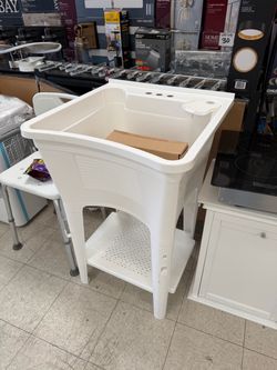 Glacier Bay 24.1 in. L x 24.1 in. W x 36.7 in. H Laundry Sink / Utility Sink Work Center in White with Pull-Out Faucet in Chrome