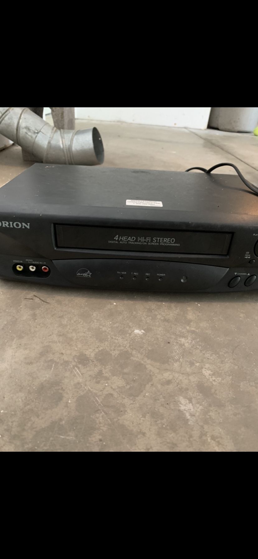 VHS player and Christmas VHS tapes