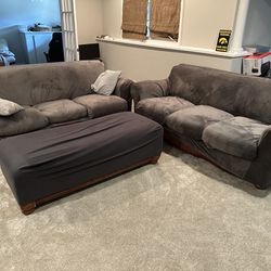 2 Leather Couches Plus Matching Leather Ottoman