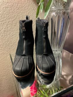 Ugg Women’s Leather heel boots size 9