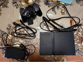 PS2 slim : FOR PARTS OR REPAIR