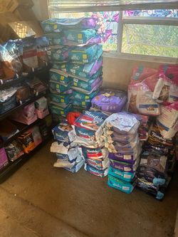 Large Lot of blue buffalo Cat and Dog Food