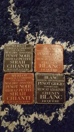 Four wine themed coaster set