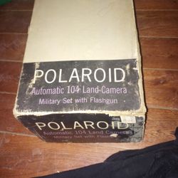 Vintage Polaroid Camera With Flash