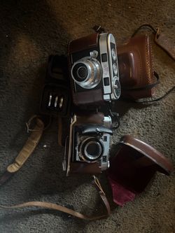 Vintage Film Cameras with Leather Cases