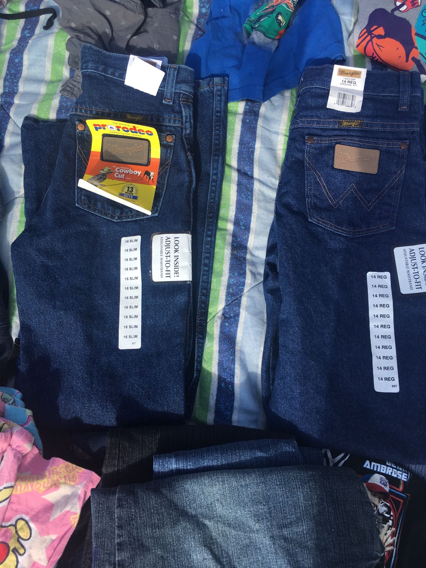 Wrangler pants size 16 slim and 14 regular 2 for $40