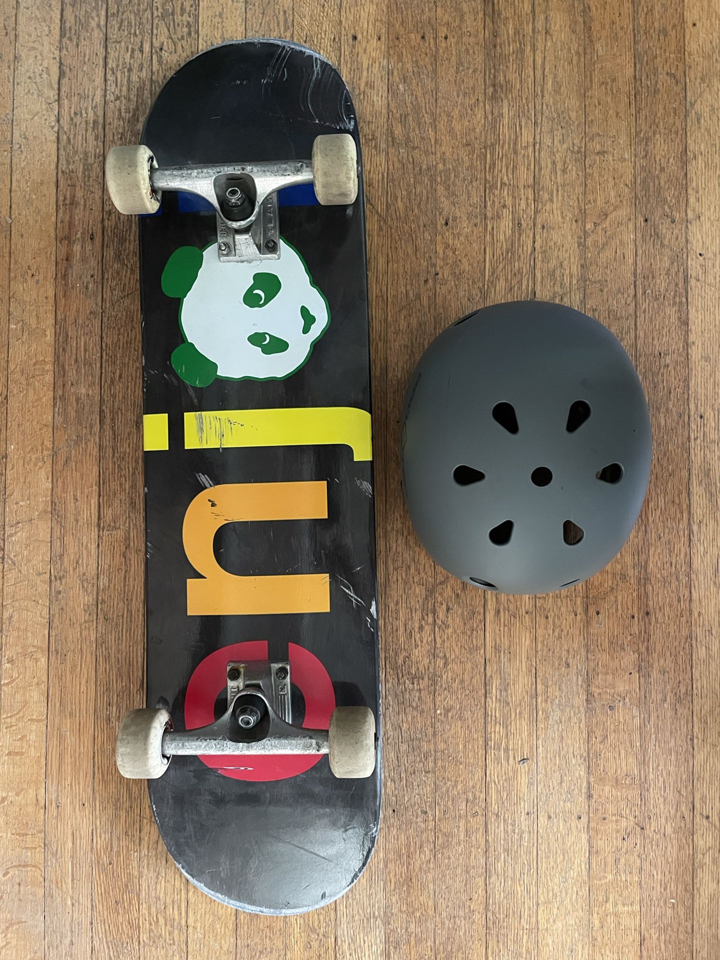 Enjoi Skateboard And Helmet