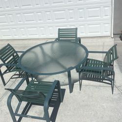 Outdoor table.  Name of the table brown Jordan.