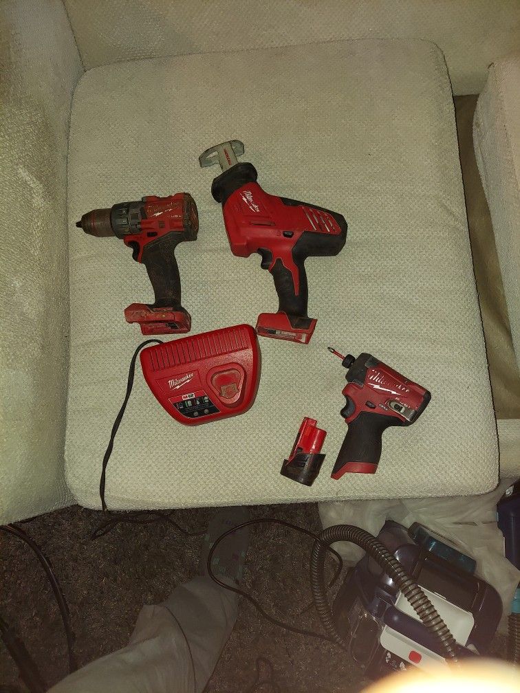 Milwaukee Drills And Charger