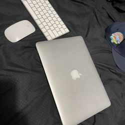 MacBook Pro With Wireless Keyboard And Mouse 