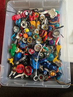 Huge lot of beyblades - over 100