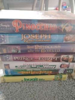 14 Clamshell VHS tapes.  $11