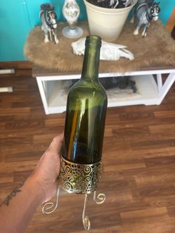 Wine bottle tea light candle holder