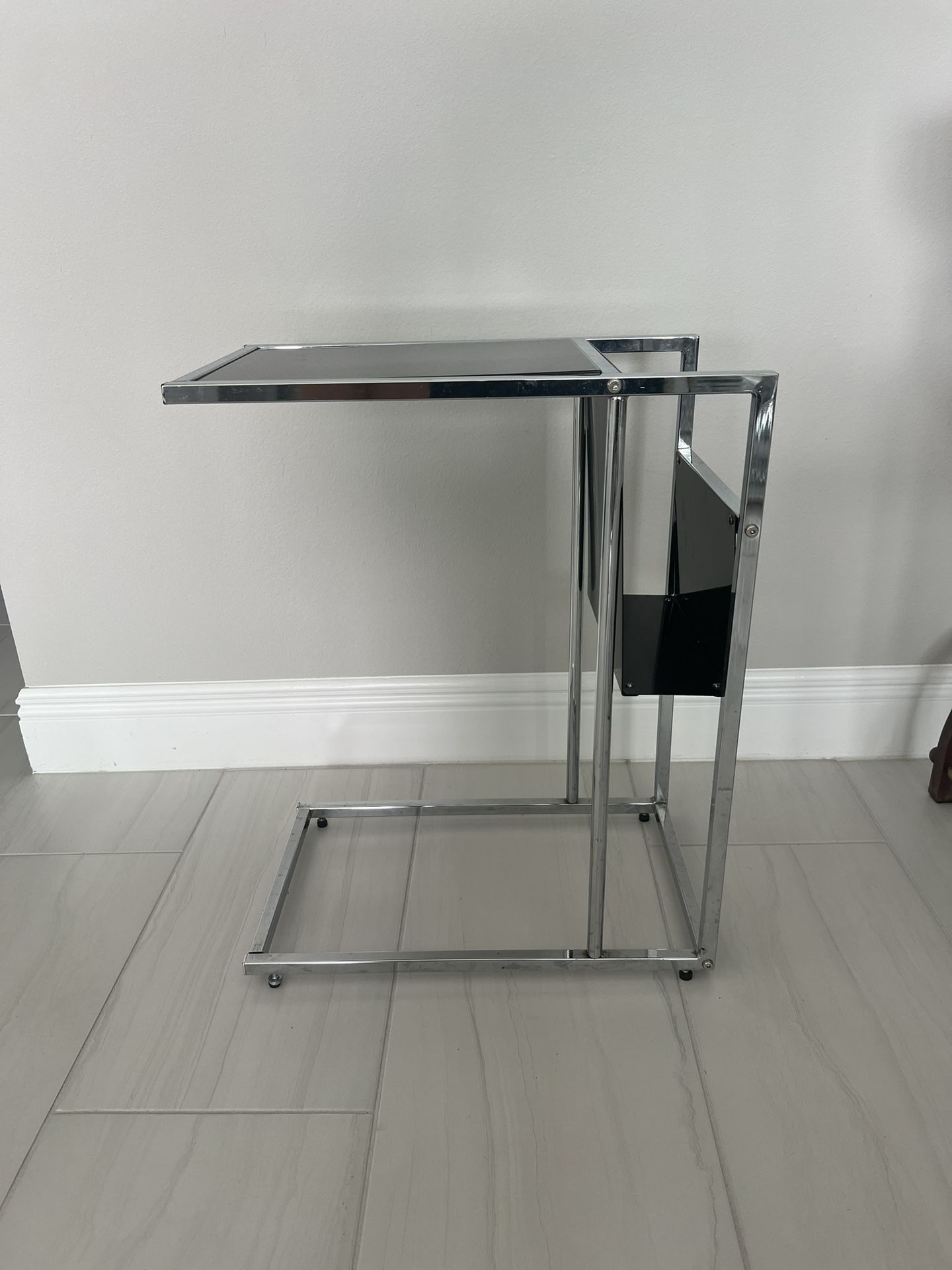 Chrome and black glass end table, nightstand, or TV tray with magazine rack on side