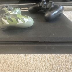 Sony PS4 Slim 1TB console + Two controllers