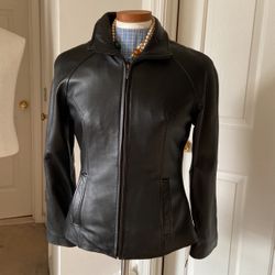 Women leather jacket by Wilson’s leather never been used