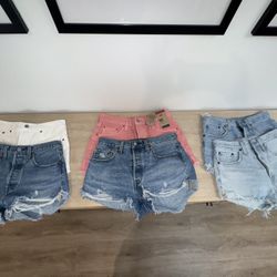 Levi’s 501 High Rise Shorts 3 pairs size 27 3 pairs size 28  Most never worn, a couple worn a few times.  Pink pair and white pair were originally $55
