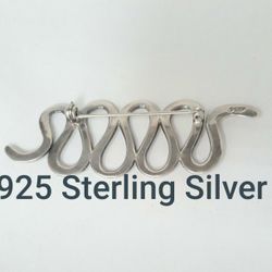 Large Sterling Silver Brooch on Hanging Rode