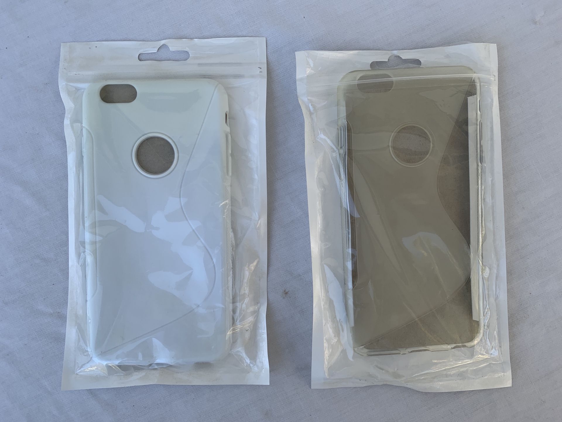 Qty. 2 iPhone 7 Plus (8 Plus too?) cases, white, clear