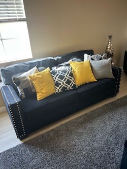 Black living room set with Nailhead Trim