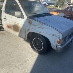 1995 Nissan hardbody, parts, doors, fenders, and bed