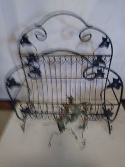 Metal Book/ newspaper stand. Woodland Hills California.