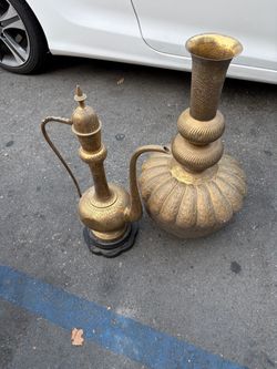 Vintage hand-etched brass Aftaba and ewer pitchers made in India.