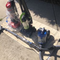3  vacuum cleaners