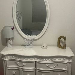 Full-size white bed set with dresser