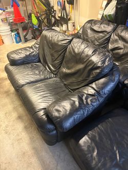 Spacious Black Leather Loveseat
